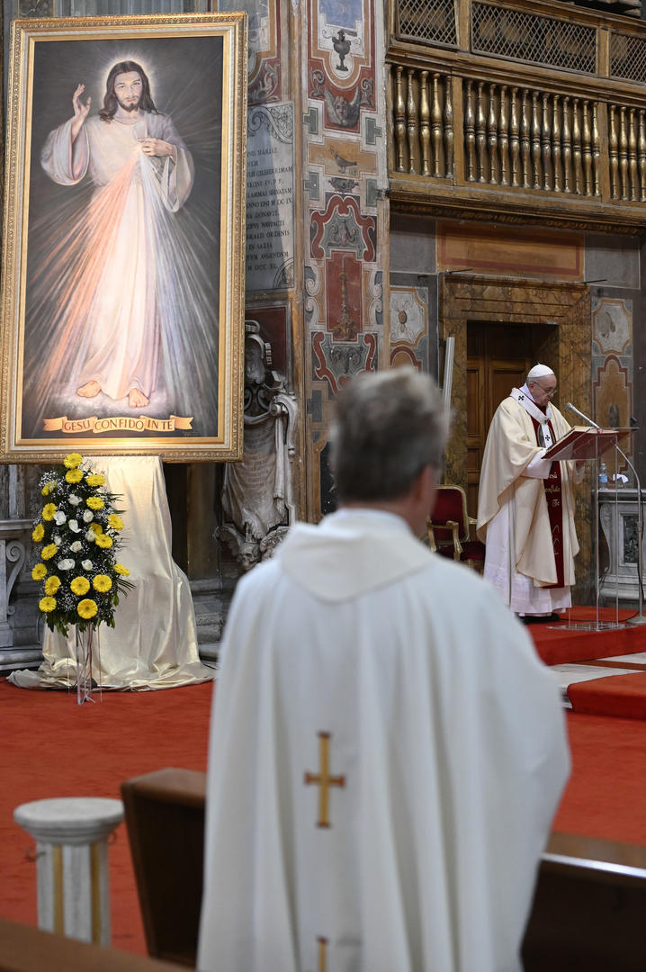 An image of Jesus of Divine Mercy is seen as Pope Francis celebrates Mass marking the feast of Divine Mercy at the Church of the Holy Spirit near the Vatican in Rome April 19, 2020. The church houses a sanctuary dedicated to Divine Mercy. (CNS photo/Vatican Media) 