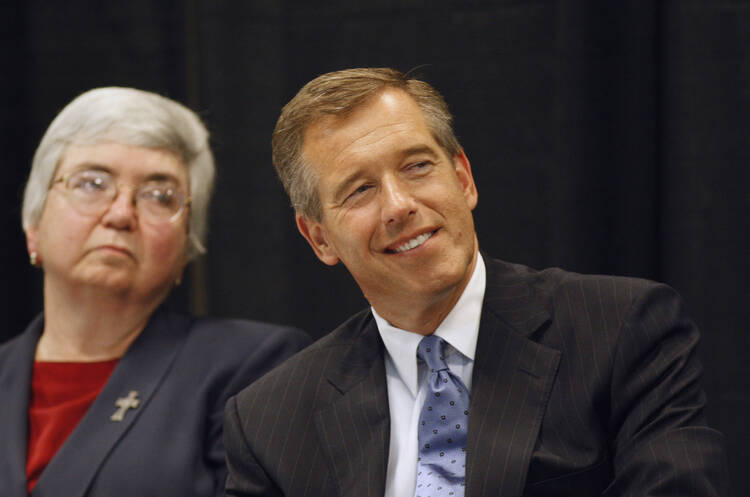 Sister Mary Ann Walsh and Brian Williams at the Catholic Common Ground Initiative's annual Philip J. Murnion Lecture at The Catholic University of America in 2008. (CNS photo/Nancy Wiechec)