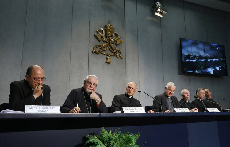 Byzantine Bishop Dimitrios Salachas of Greece, second from left, speaks at a a press conference for the release of Pope Francis' documents concerning changes to marriage annulments at the Vatican Sept. 8. (CNS photo/Paul Haring)
