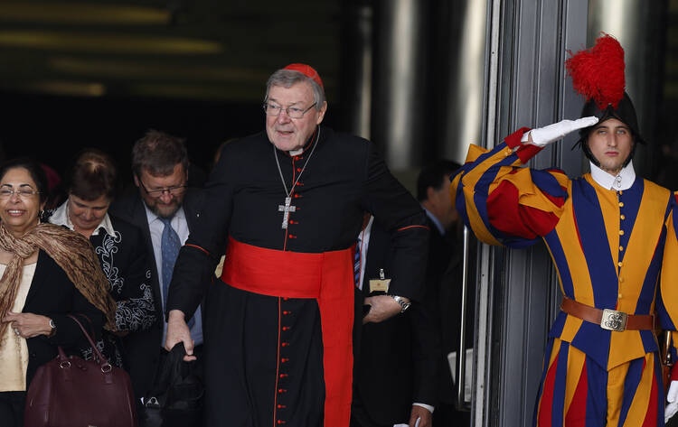 Australian Cardinal George Pell, prefect of the Vatican Secretariat for the Economy, leaves a session of the Synod of Bishops on the family at the Vatican in this Oct. 23 file photo. (CNS photo/Paul Haring)