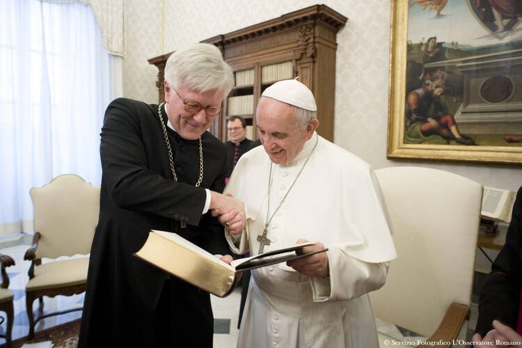 Pope Francis and Bishop Heinrich Bedford-Strohm, chair of the Council of the Evangelical Church in Germany, meet at the Vatican Feb. 6. (CNS photo/L'Osservatore Romano) 