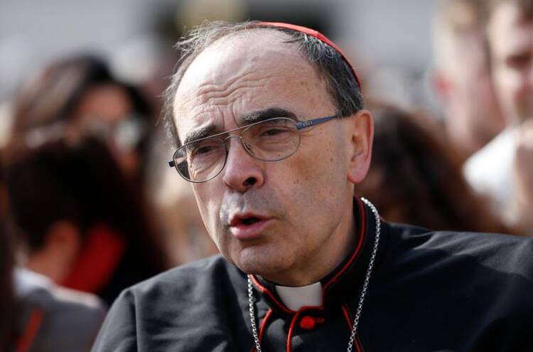 Cardinal Philippe Barbarin of Lyon, France, is pictured before the start of Pope Francis' general audience in St. Peter's Square at the Vatican on April 26. (CNS photo/Paul Haring)