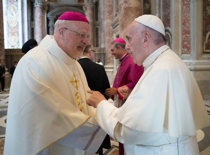 Pope Francis greets Swedish Bishop Anders Arborelius of Stockholm in 2016 at the Vatican. Cardinal-designate Arborelius is one of five new cardinals the pope will create at a June 28 consistory. (CNS photo/L'Osservatore Romano via Reuters)