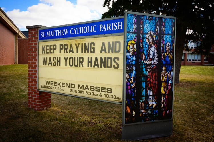 A sign outside of St. Matthew Church in Allouez, Wis., March 13, 2020, reminds people how to take care during the coronavirus pandemic. (CNS photo/Sam Lucero, The Compass)