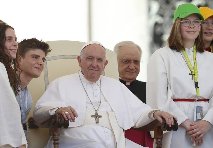 Pope Francis meets altar servers during his general audience in St. Peter's Square at the Vatican June 8, 2022.