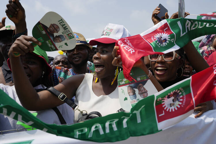 Supporters of Nigeria’s Labour Party’s Presidential Candidate Peter Obi, chants during an election campaign rally at the Tafawa Balewa Square in Lagos, Nigeria, on Feb. 11, 2023. (AP Photo/Sunday Alamba, File)