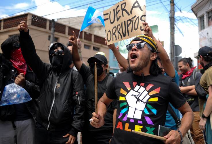 Supporters of presidential candidate Bernardo Arévalo of the Seed Movement party protest in Guatemala City, Guatemala, July 13, 2023, outside the Guatemala Attorney General's office to demand respect to the results of the Guatemala first round of presidential elections. (OSV News photo/Cristina Chiquin, Reuters)