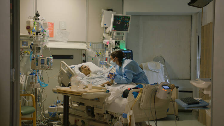 Harold and Margaret Engel pictured in a hospital room in a scene from ‘A Still Small Voice’