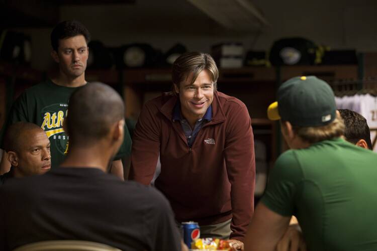Brad Pitt stars in a scene from the movie “Moneyball.” (CNS photo/Columbia)