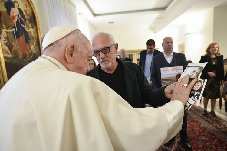 Pope Francis meets relatives of hostages taken from Israel by Hamas militants in his residence at the Vatican on Nov. 22, 2023. (CNS photo/Vatican Media)