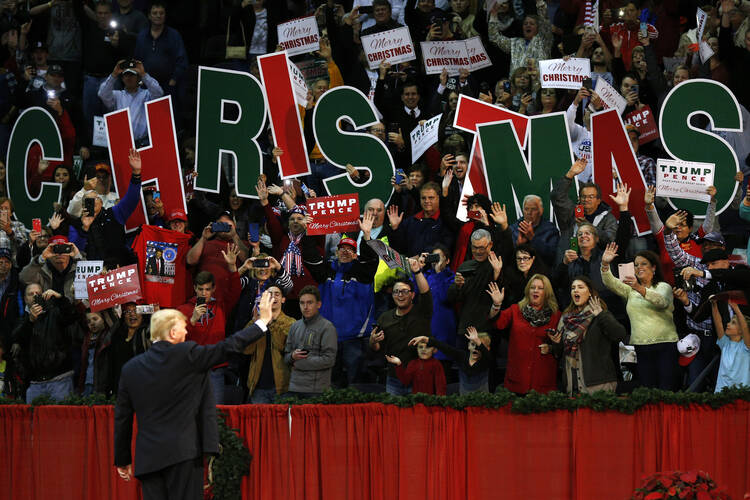 President Donald Trump waves to supporters during a rally in Pensacola, Fla., Friday, Dec. 8, 2017. (AP Photo/Jonathan Bachman)