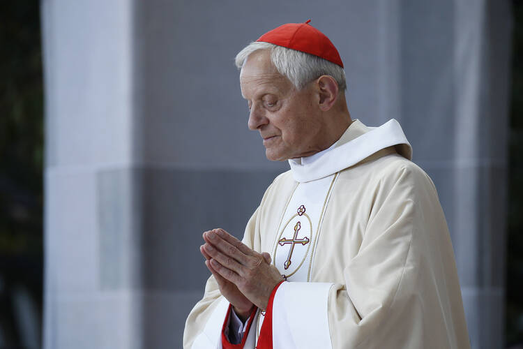 Cardinal Donald W. Wuerl of Washington is pictured as Pope Francis celebrates Mass in Washington Sept. 23, 2015. (CNS photo/Paul Haring)