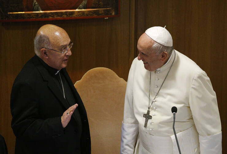  Pope Francis talks with Cardinal Pedro Barreto Jimeno of Huancayo, Peru, during the afternoon session of the Synod of Bishops for the Amazon at the Vatican Oct. 8, 2019. (CNS photo/Paul Haring) 