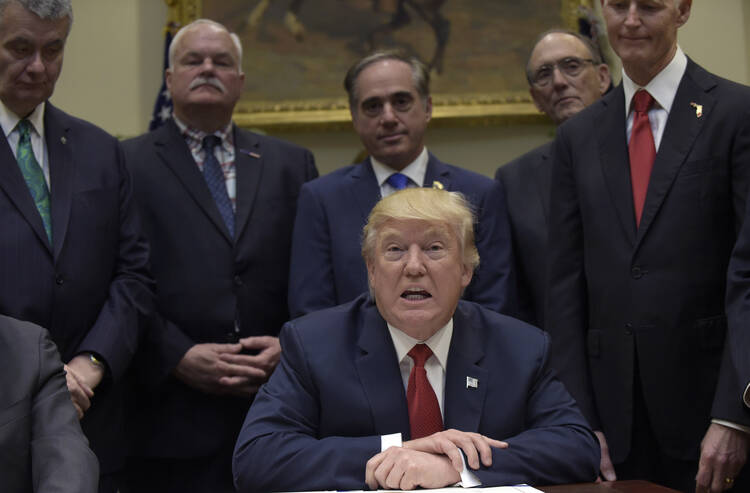 President Donald Trump talks about the Veterans Choice Program Extension and Improvement Act before signing it, Wednesday, April 19, 2017, in the Roosevelt Room of the White House in Washington. (AP Photo/Susan Walsh)