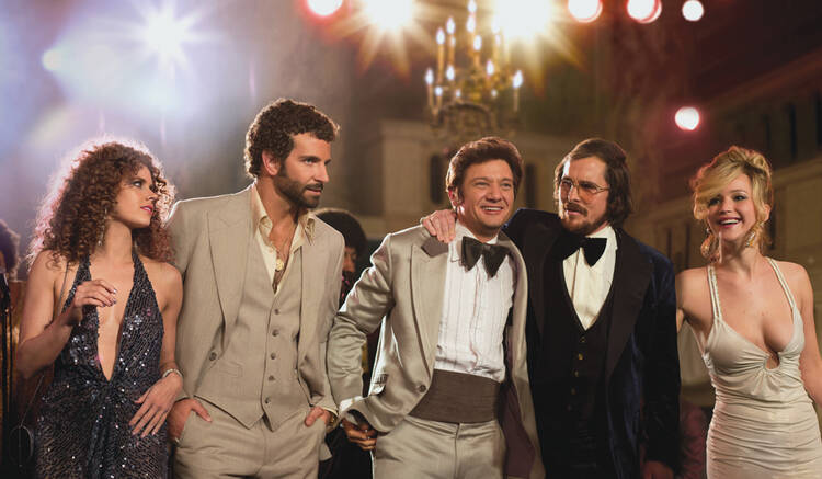 BOOGIE FRIGHTS. Amy Adams, Bradley Cooper, Jeremy Renner, Christian Bale and Jennifer Lawrence in "American Hustle"
