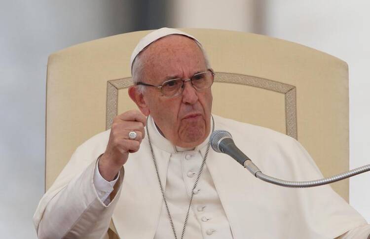 Pope Francis gestures during his general audience in St. Peter's Square at the Vatican Oct. 26. (CNS photo/Paul Haring)
