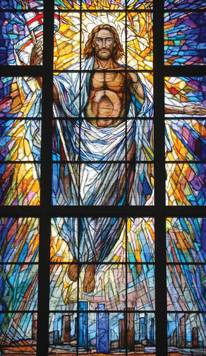 Stained-glass window depicting Christ rising over the city of Houston