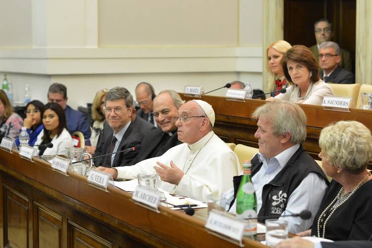 Judging Wising. Pope Francis addresses Vatican summit on combating human trafficking. Photo courtesy of Pontifical Academy of Social Sciences