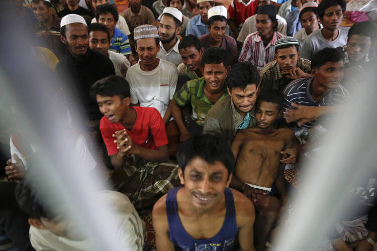 Rohingya human trafficking victims held in a detention cell near the Thailand-Malaysian border in February. (CNS photo/Damir Sagolj, Reuters)