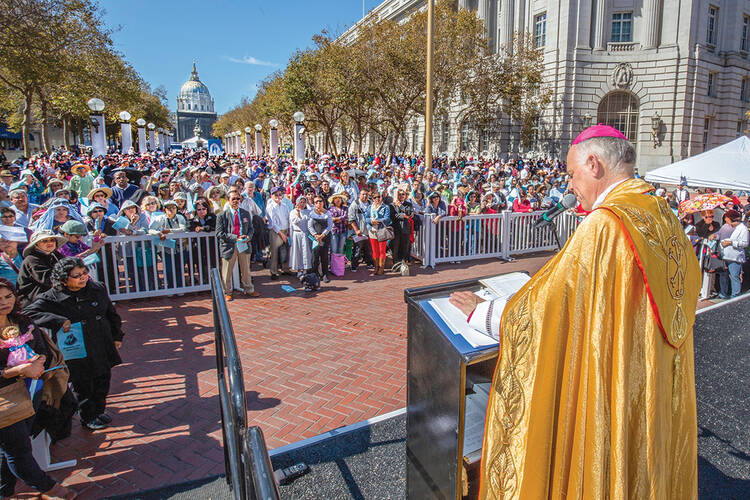 RALLYING THE FAITHFUL. Archbishop Salvatore J. Cordileone of San Francisco speaks to a crowd gathered for the fourth annual rosary rally last October. ￼
