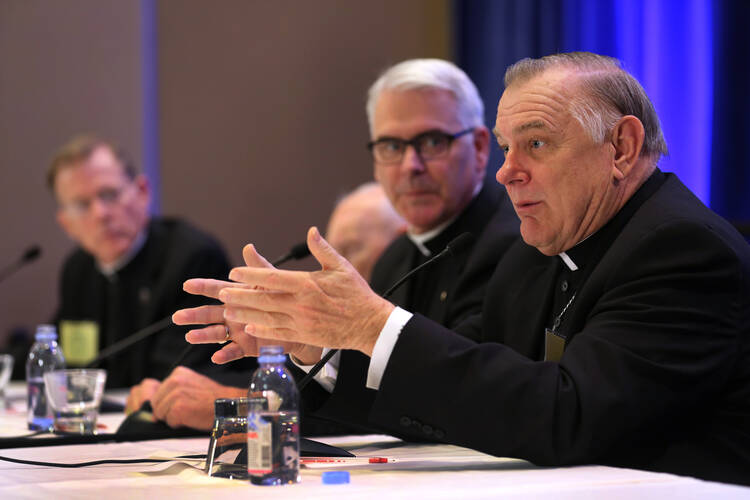 Miami Archbishop Thomas G. Wenski responds to a question during a Nov. 11 news conference at the annual fall general assembly of the U.S. Conference of Catholic Bishops in Baltimore.
