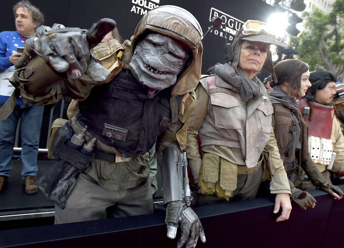 Characters from "Rogue One: A Star Wars Story" appear at the film's world premiere at the Pantages Theatre on Dec. 10 in Los Angeles. (Photo by Jordan Strauss/Invision/AP)