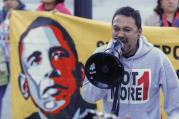 Tomas Martinez shouts into a megaphone during an immigration reform rally at the Atlanta City Detention Center in Atlanta Nov. 21. The year 2014 brought potentially significant changes for millions of people who are in the United States illegally. (CNS/EPA)