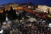 100,000 people protest against the austerity measures in front of parliament building in Athens (29 May 2011).