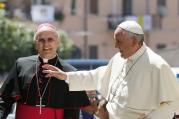 Pope Francis greets people as he visits Cassano allo Ionio, in Italy's Calabria region, with Bishop Nunzio Galantino of Cassano allo Ionio. (CNS photo/Paul Haring) 