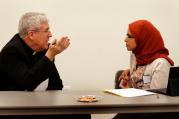 Oblate Father John Crossin is pictured talking with Humaira Basith of the Council of Islamic Organizations of Greater Chicago in this 2012 photo. (CNS photo/Karen Callaway, Catholic New World)