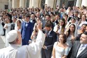 Pope Francis greets young married couples in St. Peter's Square, Sept. 30. (CNS photo/L'Osservatore Romano) 