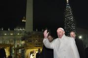 Pope Francis greets the crowd in St. Peter's Square after visiting the Nativity scene in the square on New Year's Eve at the Vatican Dec. 31. (CNS photo/Paul Haring)