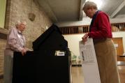 A Maryknoll sister casts her vote at a polling station inside her religious community's auditorium in 2010 in Ossining, N.Y. (CNS photo/Jessica Rinaldi, Reuters)