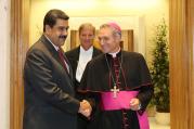 Venezuelan President Nicolas Maduro is greeted by Archbishop Georg Ganswein, prefect of the papal household, prior to an Oct. 24 private meeting between Maduro and Pope Francis at the Vatican. (CNS photo/Miraflores Palace handout via EPA)