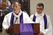 Bishop Mitchell T. Rozanski of Springfield, Mass., addresses the congregation alongside Lutheran Bishop Donald Kreiss, chair of the Evangelical Lutheran Church in America's ecumenical and interreligious relations committee, during a March 2, 2017, prayer service in Chicago. (CNS photo/Karen Callaway, Chicago Catholic) 