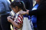 Marilyn Miranda, 9, draped in a Salvadoran flag, attends an immigration rally with her mother outside the U.S. Capitol in Washington June 4, 2019. A Sept. 14, 2020, decision from the U.S. Court of Appeals for 9th Circuit in Ramos v. Nielsen brings the Trump administration one step closer to ending Temporary Protected Status, or TPS, for almost all people with TPS in the United States. (CNS photo/Leah Millis, Reuters)