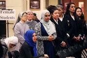 Students from MDQ Academy Islamic School in Brentwood, N.Y., and St. Anthony’s High School in nearby Huntington, N.Y., listen to speakers at an interfaith event at the Catholic school on April 26, 2017. (CNS photo/Shannon Stapleton, Reuters)