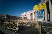 Several visitors enter an empty security queue before visiting St. Peter's Basilica at the Vatican on March 4. Visitors and pilgrims to churches, museums and landmarks in Rome have sharply declined following an outbreak of the COVID-19 coronavirus in northern Italy. (CNS photo/Junno Arocho Esteves)