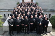 The staff and 92 seminarians at the Pontifical North American College in Rome pose for a photograph March 15, 2020, on the steps leading to the seminary chapel. A week later, the college informed the seminarians that they should return to the United States because of the ongoing COVID-19 pandemic. (CNS photo/courtesy of the Pontifical North American College)
