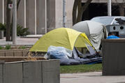 Homeless camp set up in park in middle of University Avenue in downtown Toronto by the Court House during Covid-19 pandemic on April 3, 2020.
