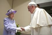 Pope Francis greets Britain's Queen Elizabeth II during a meeting at the Vatican on April 3, 2014.