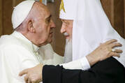FILE — In this Friday, Feb. 12, 2016 file photo, Pope Francis, left, reaches to embrace Russian Orthodox Patriarch Kirill after signing a joint declaration at the Jose Marti International airport in Havana, Cuba. The Vatican confirmed Monday that Pope Francis will travel next month to Kazakhstan, where he could meet with Patriarch Kirill, the leader of the Russian Orthodox Church who has justified Moscow’s war in Ukraine. (AP Photo/Gregorio Borgia, Pool)