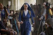 Betty Gilpin as an AI-fighting nun in ”Mrs. Davis”