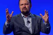 The New York Times columnist Ross Douthat gestures to the crowd participates at FreedomFest 2018, an annual gathering of Libertarians, held in Las Vegas, Nevada, on July 11, 2018.