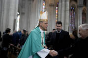 Monsignor Victor Manuel Fernandez, archbishop of La Plata, shakes hands with a a man after a Mass at the Cathedral in La Plata, Argentina, Sunday, July 9, 2023. Fernandez was appointed by Pope Francis to head the Holy See's Dicastery for the Doctrine of the Faith at the Vatican. (AP Photo/Natacha Pisarenko)