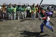 Mine workers sing during the commemoration ceremonies in Marikana, South Africa, on Aug. 16, 2017. Protestors complain that no one has been punished and conditions have not improved since Aug. 16, 2012, when police opened fire on workers demanding wage increases and better living conditions. (AP Photo/Themba Hadebe)