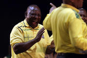 South African Deputy President, Cyril Ramaphosa, laughs at President Jacob Zuma, right, at the start of the ruling African National Congress elective conference in Johannesburg on Dec. 16. (AP Photo/Themba Hadebe, File)
