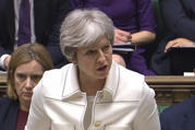 Britain's Prime Minister Theresa May makes a statement in the House of Commons on April 16 regarding her decision to join air strikes against Syria. (PA via AP)