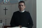 Reverend Toller is a cleric cut from the cloth of Graham Greene’s “whiskey priest” (photo: A24). 