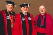 Dr. Joseph J. McGowan, president of Bellarmine University, Patrick Hart, O.C.S.O., and Archbishop Thomas Kelly during the ceremony at which Brother Hart received an honorary degree from Bellarmine University on May 10, 2003. (Courtesy of Bellarmine University)